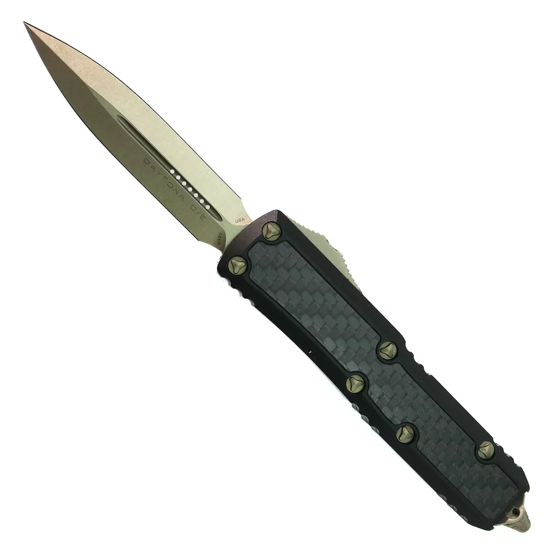 Microtech Signature Series Daytona D/E OTF Carbon Fiber Inlay Auto Knife, Bronze Dagger Blade 3 Microtech Signature Series Daytona D/E OTF Carbon Fiber Inlay Auto Knife, Bronze Dagger Blade